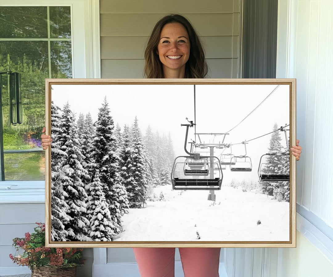 The Ski Wall Art, featuring the "Ski Lift Wall Art Canvas Print," presents a snowy scene with snow-covered spruce trees and is elegantly showcased on a dark green wall.