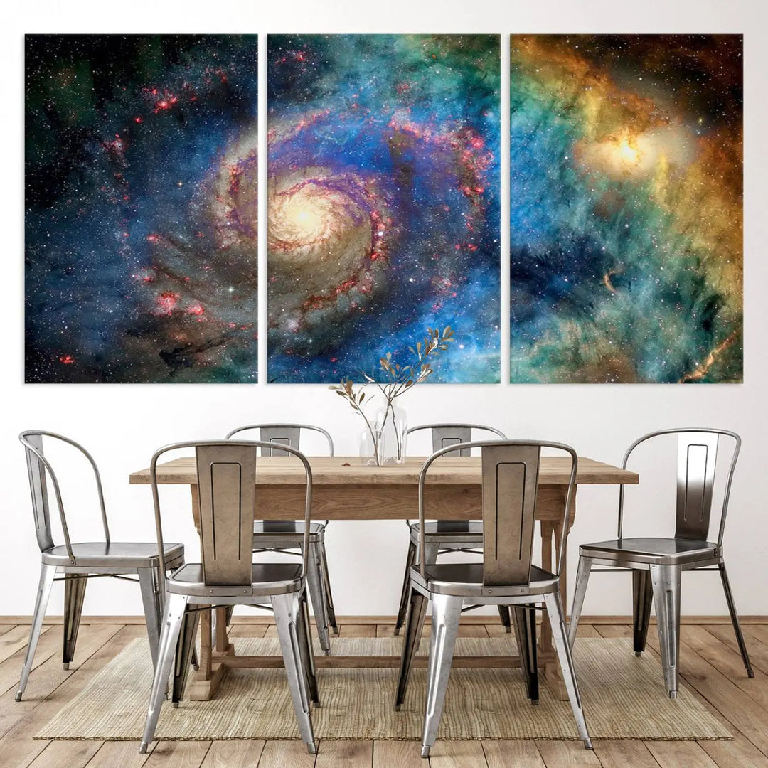 The living room showcases three colorful space-themed paintings titled "Spiral Galaxy Wall Art Canvas Print" on the wall, featuring museum-quality craftsmanship with vibrant colors through high-resolution printing.