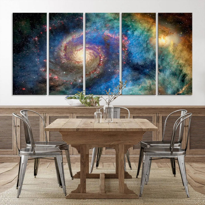 The living room showcases three colorful space-themed paintings titled "Spiral Galaxy Wall Art Canvas Print" on the wall, featuring museum-quality craftsmanship with vibrant colors through high-resolution printing.