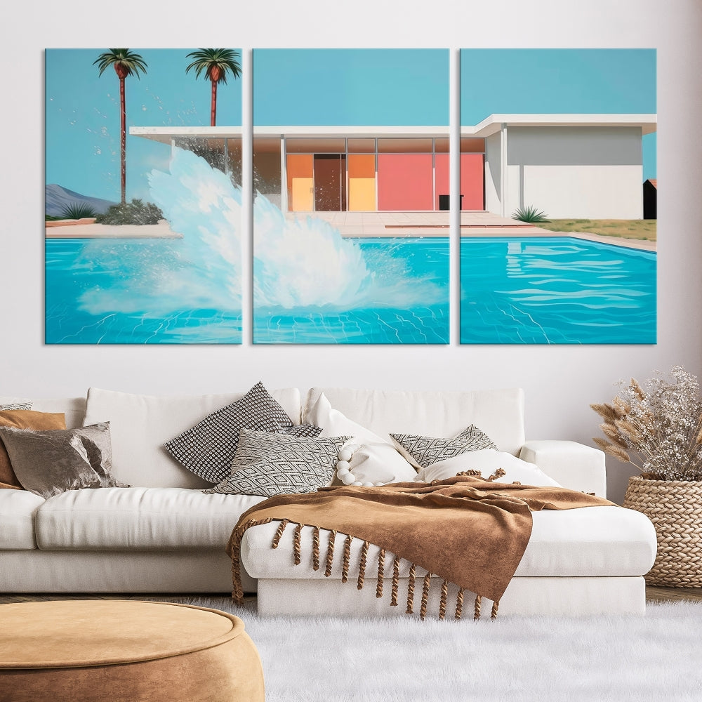 The "Splash in the Pool" Canvas Print Mid Century Wall Art features a triptych design of a pool splash in front of a mid-century modern house with palm trees. This museum-quality canvas, complete with a UV-protective coating and gallery-wrapped finish, is an ideal addition to any stylish living space.