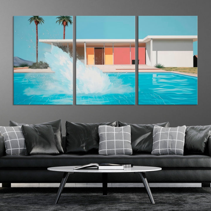 The "Splash in the Pool" Canvas Print Mid Century Wall Art features a triptych design of a pool splash in front of a mid-century modern house with palm trees. This museum-quality canvas, complete with a UV-protective coating and gallery-wrapped finish, is an ideal addition to any stylish living space.