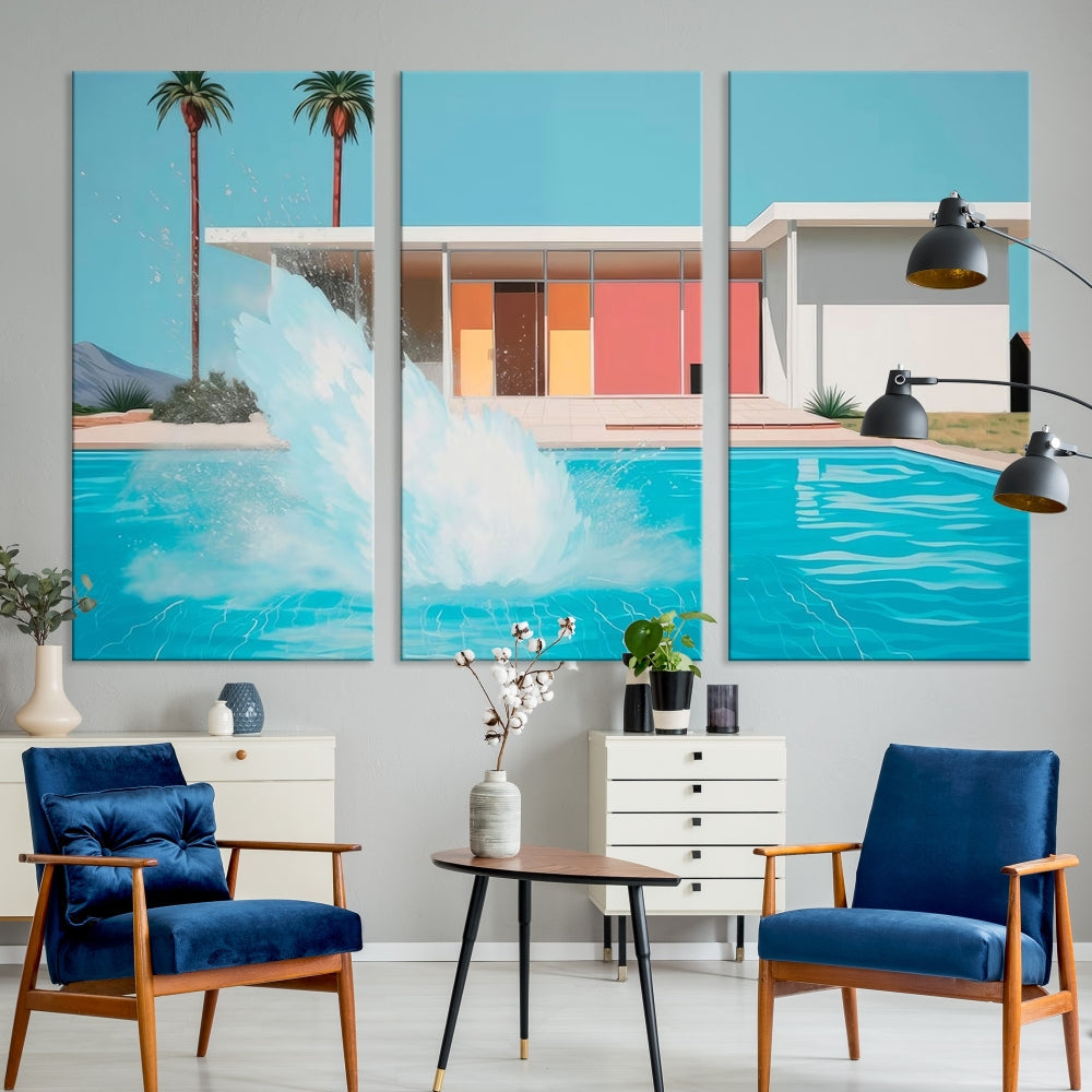 The "Splash in the Pool" Canvas Print Mid Century Wall Art features a triptych design of a pool splash in front of a mid-century modern house with palm trees. This museum-quality canvas, complete with a UV-protective coating and gallery-wrapped finish, is an ideal addition to any stylish living space.