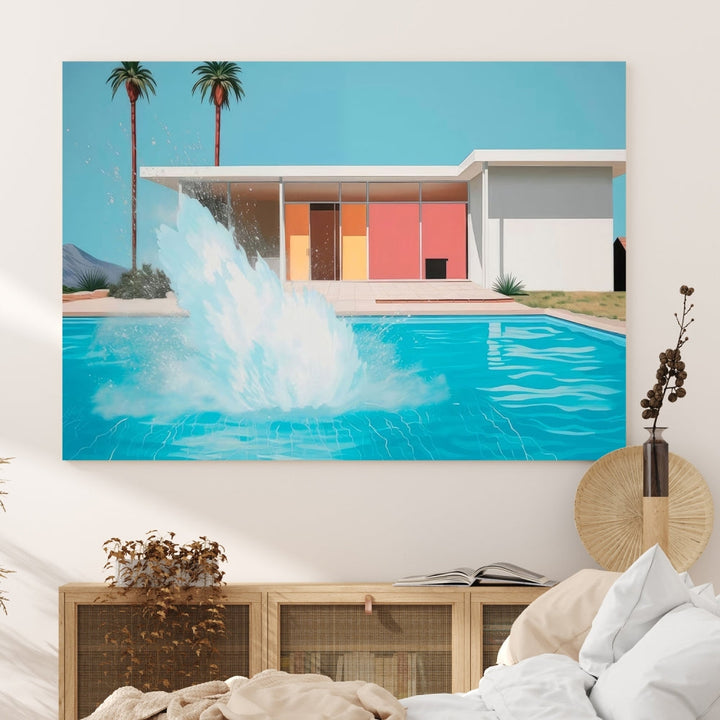 The "Splash in the Pool" Canvas Print Mid Century Wall Art features a triptych design of a pool splash in front of a mid-century modern house with palm trees. This museum-quality canvas, complete with a UV-protective coating and gallery-wrapped finish, is an ideal addition to any stylish living space.