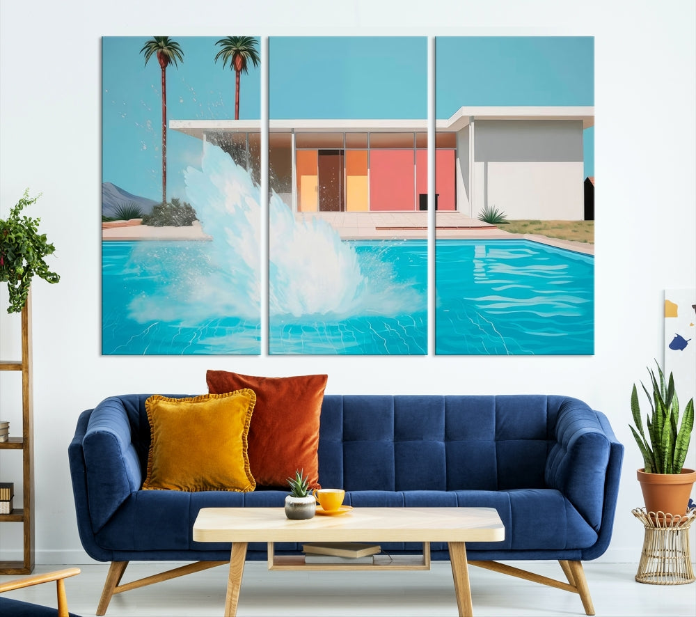 The "Splash in the Pool" Canvas Print Mid Century Wall Art features a triptych design of a pool splash in front of a mid-century modern house with palm trees. This museum-quality canvas, complete with a UV-protective coating and gallery-wrapped finish, is an ideal addition to any stylish living space.