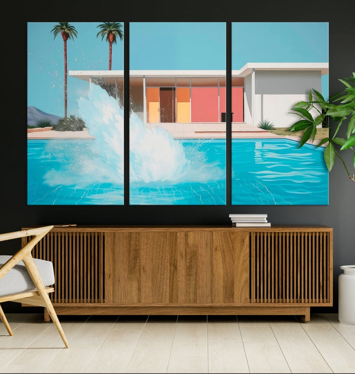 The "Splash in the Pool" Canvas Print Mid Century Wall Art features a triptych design of a pool splash in front of a mid-century modern house with palm trees. This museum-quality canvas, complete with a UV-protective coating and gallery-wrapped finish, is an ideal addition to any stylish living space.