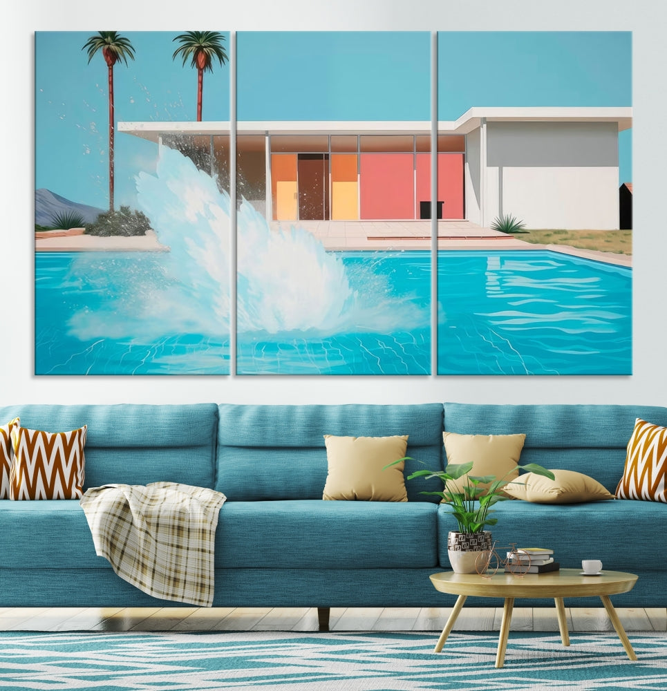 The "Splash in the Pool" Canvas Print Mid Century Wall Art features a triptych design of a pool splash in front of a mid-century modern house with palm trees. This museum-quality canvas, complete with a UV-protective coating and gallery-wrapped finish, is an ideal addition to any stylish living space.