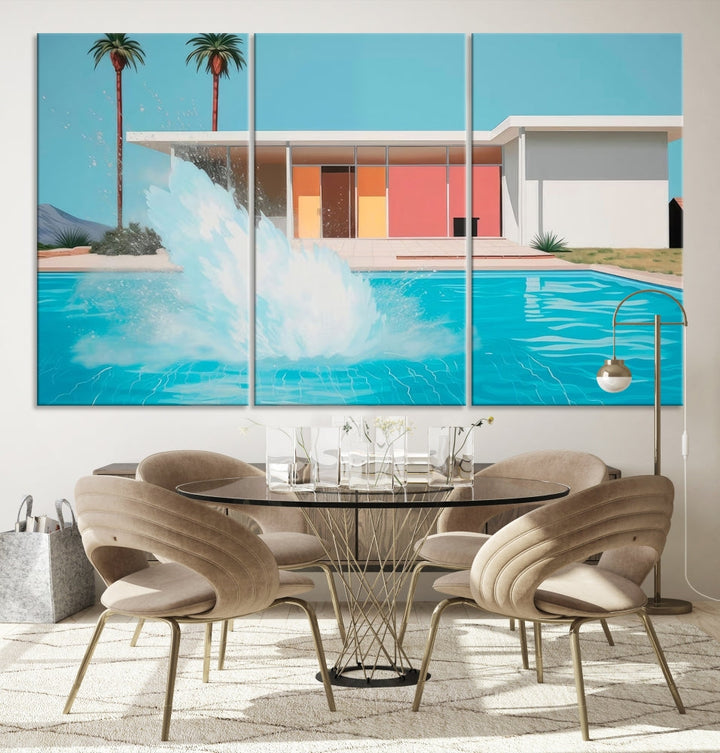 The "Splash in the Pool" Canvas Print Mid Century Wall Art features a triptych design of a pool splash in front of a mid-century modern house with palm trees. This museum-quality canvas, complete with a UV-protective coating and gallery-wrapped finish, is an ideal addition to any stylish living space.