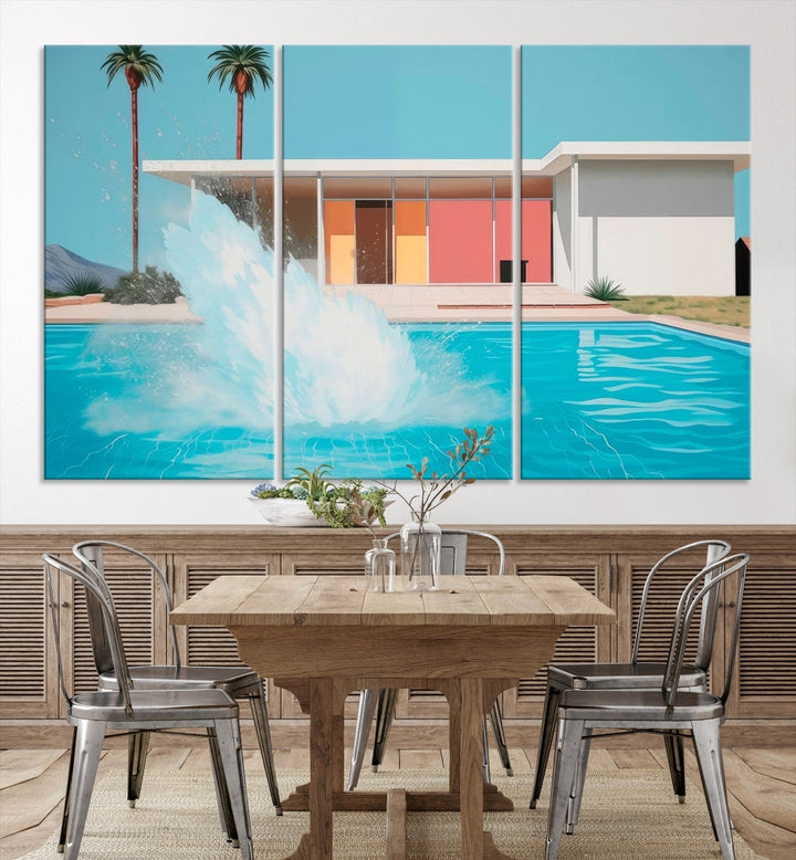 The "Splash in the Pool" Canvas Print Mid Century Wall Art features a triptych design of a pool splash in front of a mid-century modern house with palm trees. This museum-quality canvas, complete with a UV-protective coating and gallery-wrapped finish, is an ideal addition to any stylish living space.