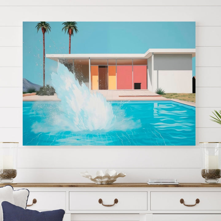 The "Splash in the Pool" Canvas Print Mid Century Wall Art features a triptych design of a pool splash in front of a mid-century modern house with palm trees. This museum-quality canvas, complete with a UV-protective coating and gallery-wrapped finish, is an ideal addition to any stylish living space.