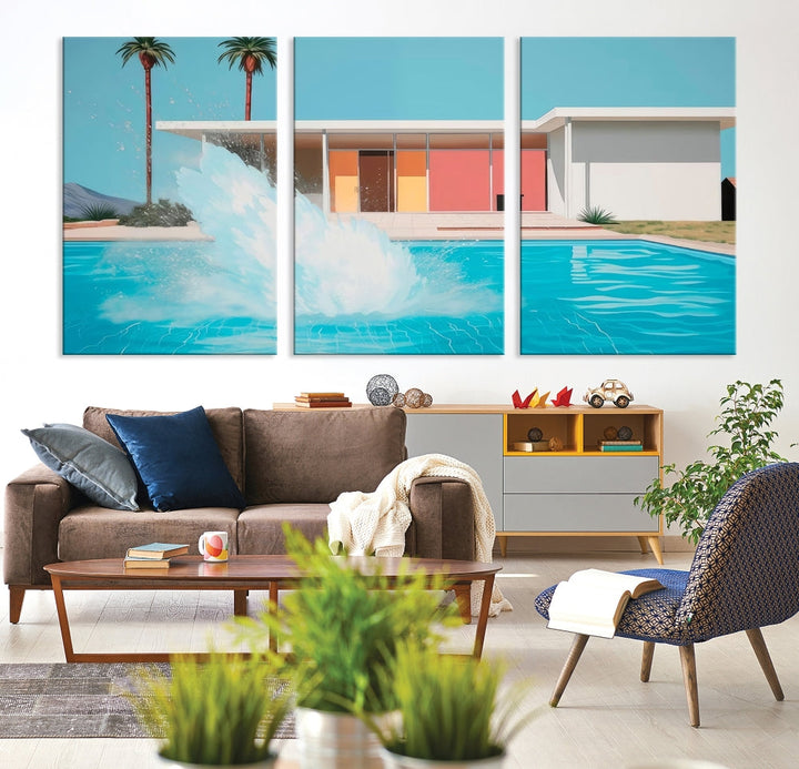 The "Splash in the Pool" Canvas Print Mid Century Wall Art features a triptych design of a pool splash in front of a mid-century modern house with palm trees. This museum-quality canvas, complete with a UV-protective coating and gallery-wrapped finish, is an ideal addition to any stylish living space.