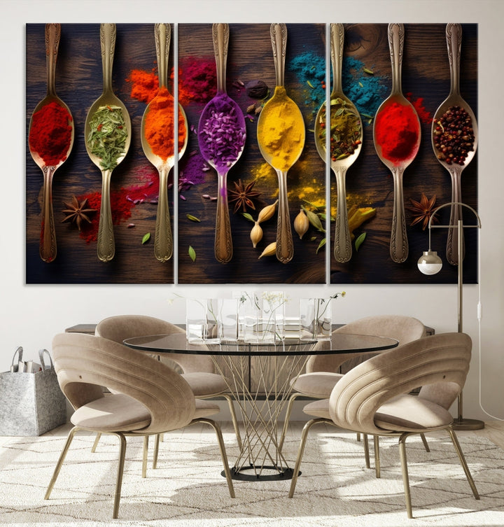 The Sponge Kitchen Wall Art Canvas Print showcases decorative artwork featuring spoons filled with colorful spices against a wooden background. Printed on museum-quality canvas, this ready-to-hang piece effortlessly adds charm and vibrancy to any space.