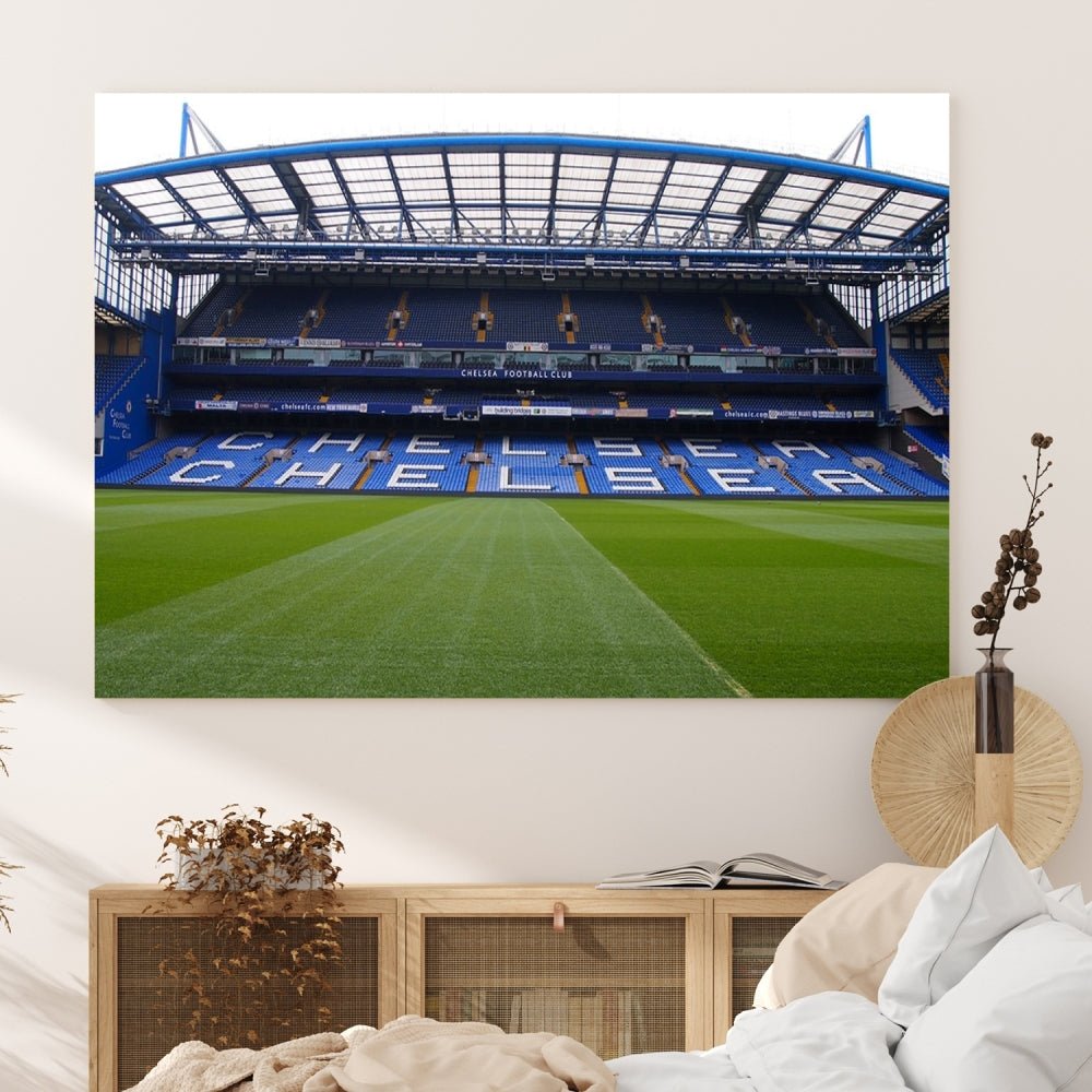 Experience the ultimate Chelsea fan's delight with our Stamford Bridge Chelsea Football Stadium Canvas Wall Art Print. This piece offers an immersive stadium experience, showcasing the vibrant green field and blue seats framed under a partial roof, right in your room. Ready to hang and enjoy!