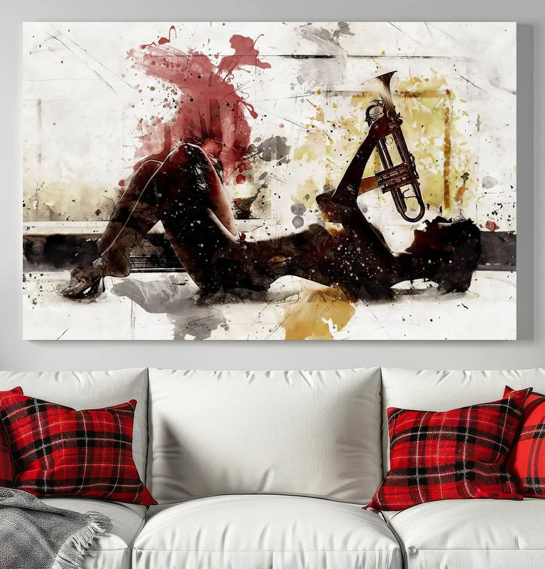 Introducing the Stylish Jazz Woman with Trumpet Triptych Canvas Art: This modern abstract wall décor features a captivating painting of a person lying with a trumpet, set against an abstract background with dynamic red and yellow splashes. This triptych artwork beautifully captures the essence of music and emotion in vibrant colors.