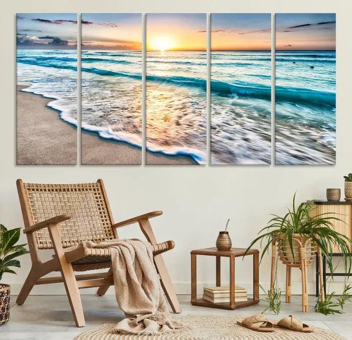 The living room features the Sunset Beach Waves Canvas Wall Art—an ocean sunset print spread over five panels that enhance your space with coastal decor. Cozy, nature-themed elements add warmth and charm to the ambiance.