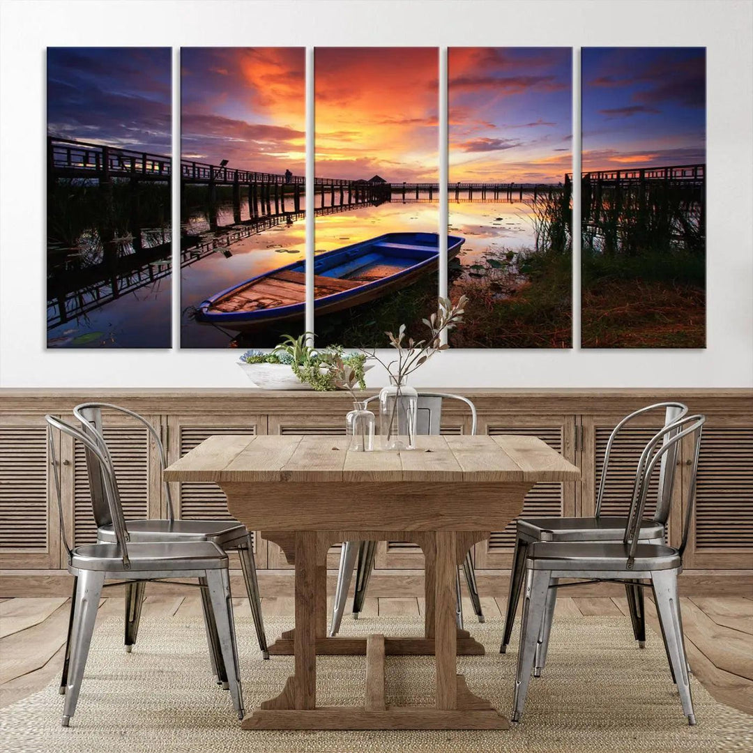 The "Sunset Boat Scene on Lake Triptych" beautifully captures a vibrant sunset over a calm lake. This tranquil scene, featuring serene reflections and surrounded by reeds, is printed on premium giclee canvas with Canon print quality. The gallery wrap design enhances every detail of tranquility.