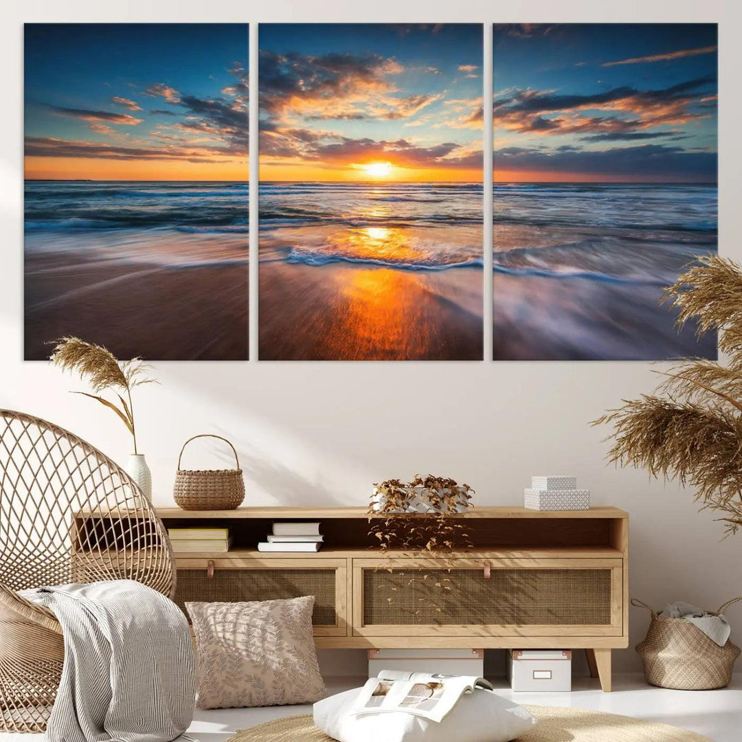 A triptych of "Sunset on the Ocean Beach with Waves," a vibrant coastal wall art print, showcases reflections on the sand during an ocean sunset.