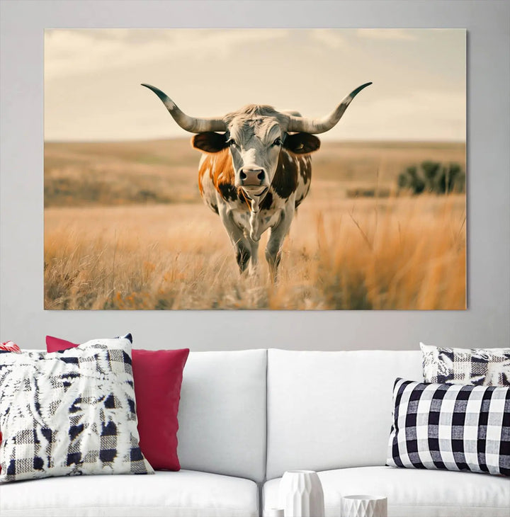 The Texas Cow Wall Art Canvas Print enhances the space with its depiction of a Texas cow in a field, adding charm to the area.