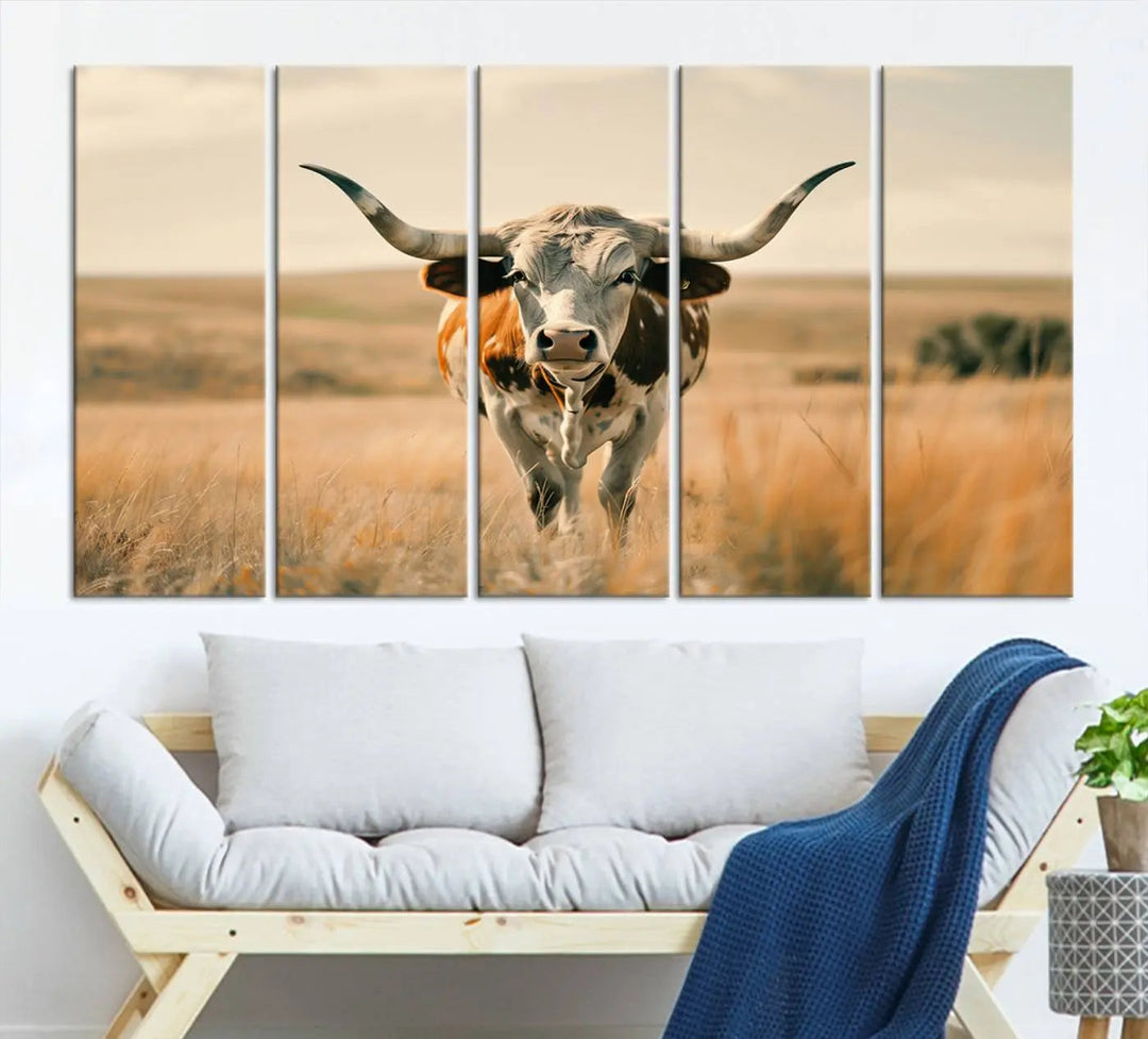 The Texas Cow Wall Art Canvas Print enhances the space with its depiction of a Texas cow in a field, adding charm to the area.