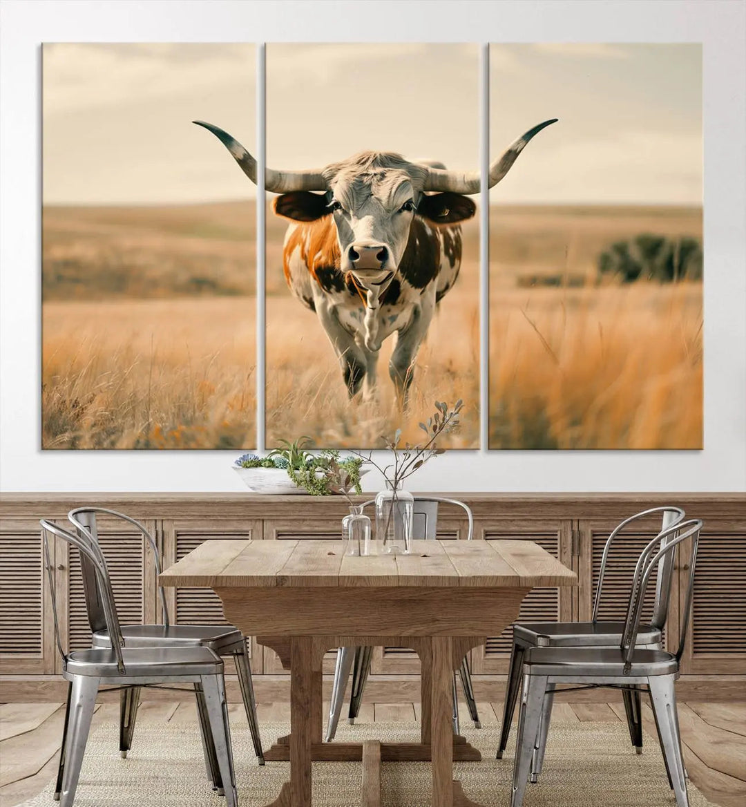 The Texas Cow Wall Art Canvas Print enhances the space with its depiction of a Texas cow in a field, adding charm to the area.