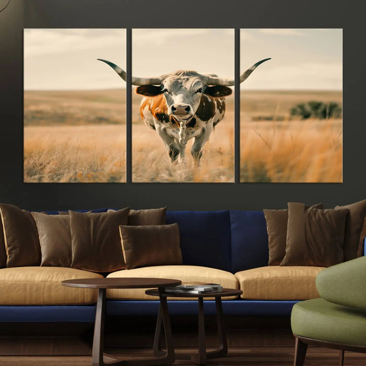 The Texas Cow Wall Art Canvas Print enhances the space with its depiction of a Texas cow in a field, adding charm to the area.