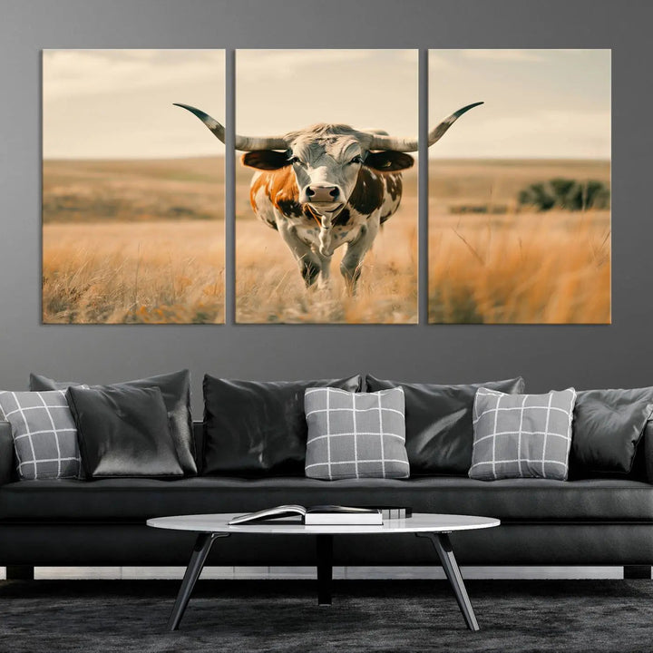 The Texas Cow Wall Art Canvas Print enhances the space with its depiction of a Texas cow in a field, adding charm to the area.