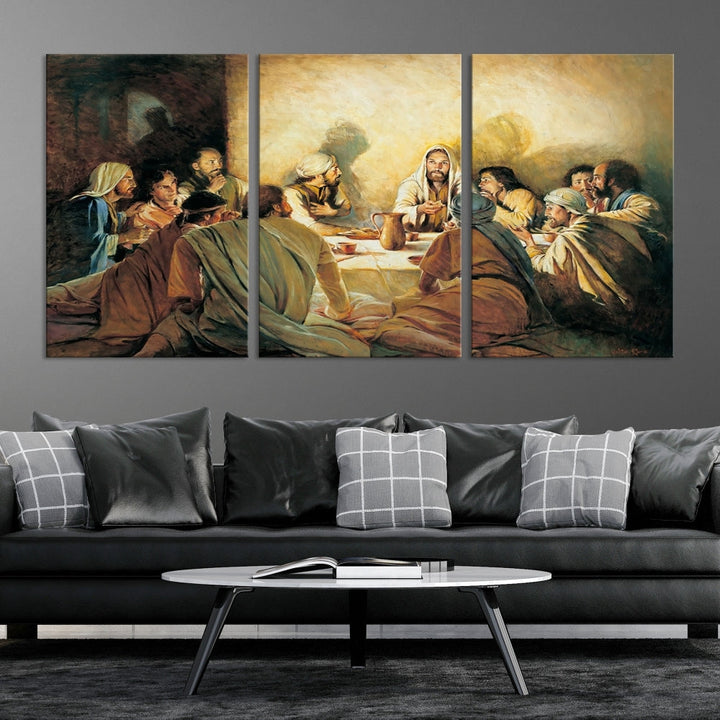 A cozy living room showcases a three-panel canvas titled "The Last Supper Canvas Wall Art – Sacred Religious Masterpiece," depicting people gathered at a table reminiscent of the Last Supper.