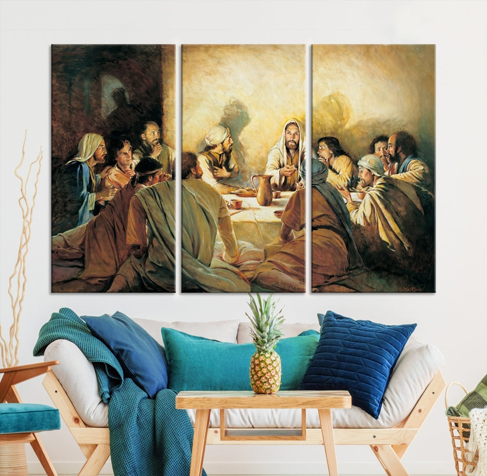 A cozy living room showcases a three-panel canvas titled "The Last Supper Canvas Wall Art – Sacred Religious Masterpiece," depicting people gathered at a table reminiscent of the Last Supper.