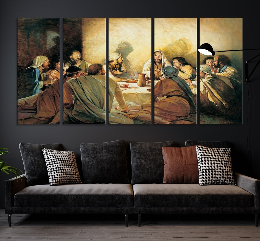 A cozy living room showcases a three-panel canvas titled "The Last Supper Canvas Wall Art – Sacred Religious Masterpiece," depicting people gathered at a table reminiscent of the Last Supper.