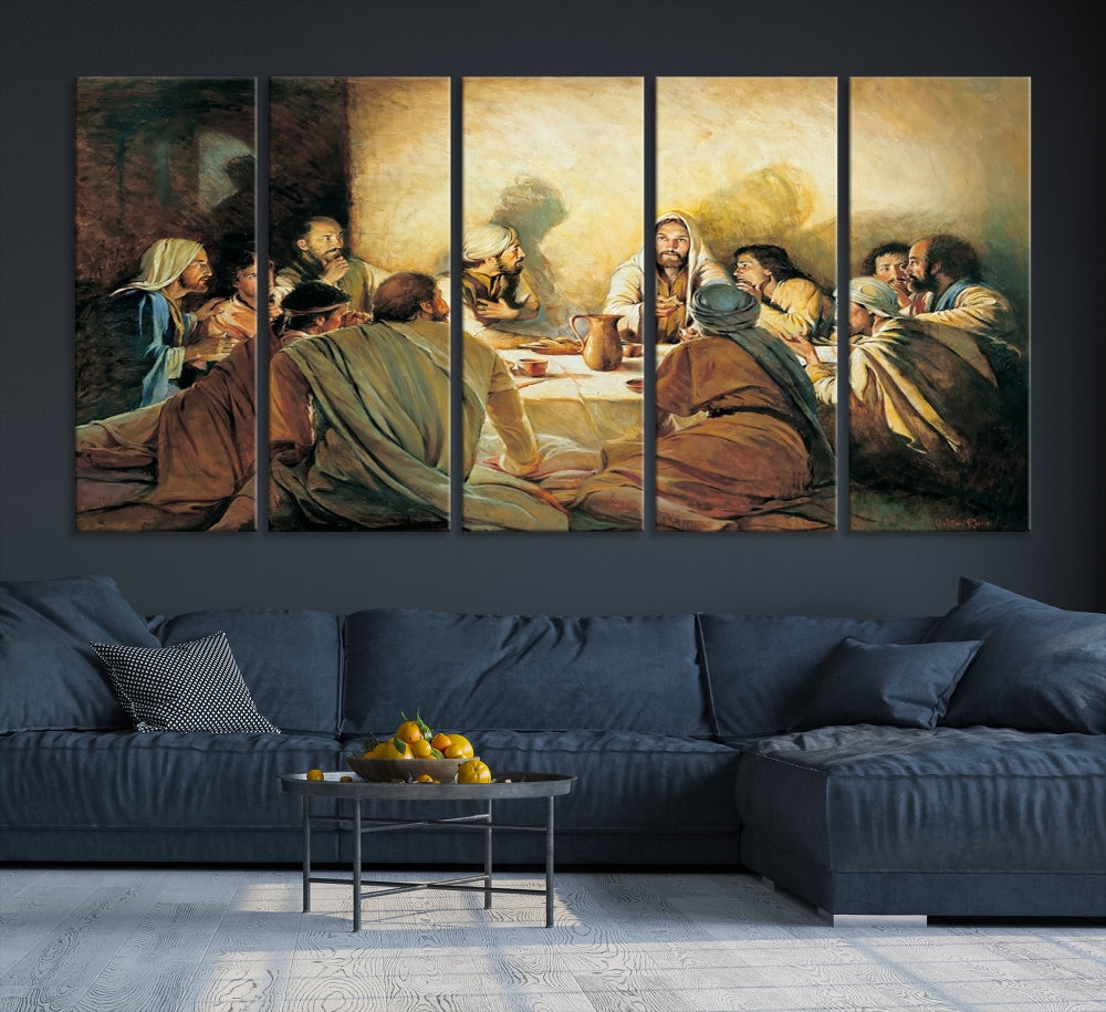 A cozy living room showcases a three-panel canvas titled "The Last Supper Canvas Wall Art – Sacred Religious Masterpiece," depicting people gathered at a table reminiscent of the Last Supper.