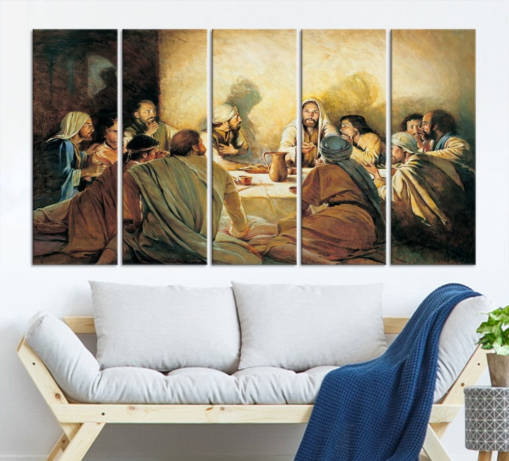 A cozy living room showcases a three-panel canvas titled "The Last Supper Canvas Wall Art – Sacred Religious Masterpiece," depicting people gathered at a table reminiscent of the Last Supper.