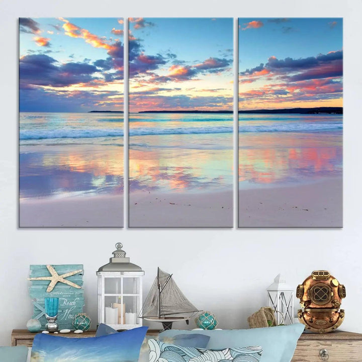 A modern living room is accentuated by a stunning Tranquil Pastel Sunset Beach Triptych Canvas Art on the wall, epitomizing coastal home decor elegance.