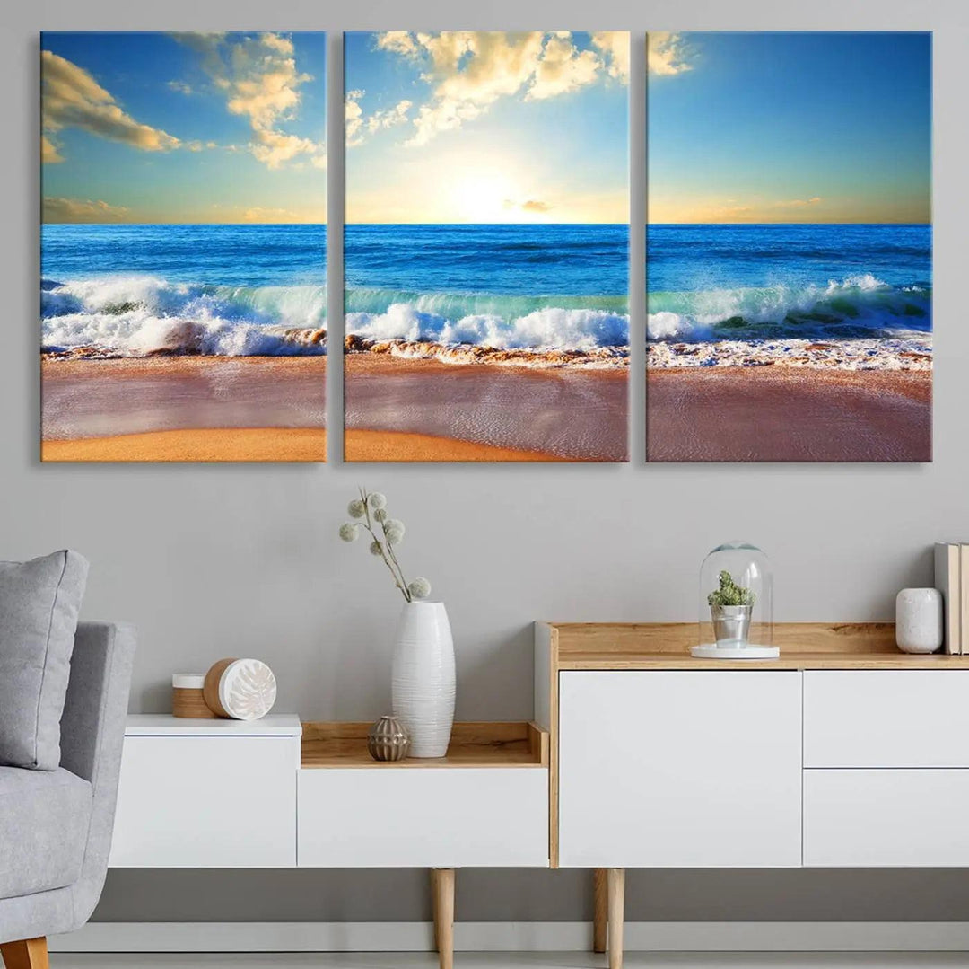 A canvas art piece titled "Tropical Beach Sunset" features ocean waves and a sandy shoreline, making it ideal for large coastal home settings.