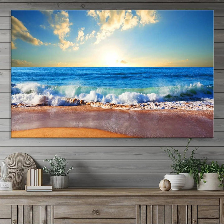 A canvas art piece titled "Tropical Beach Sunset" features ocean waves and a sandy shoreline, making it ideal for large coastal home settings.