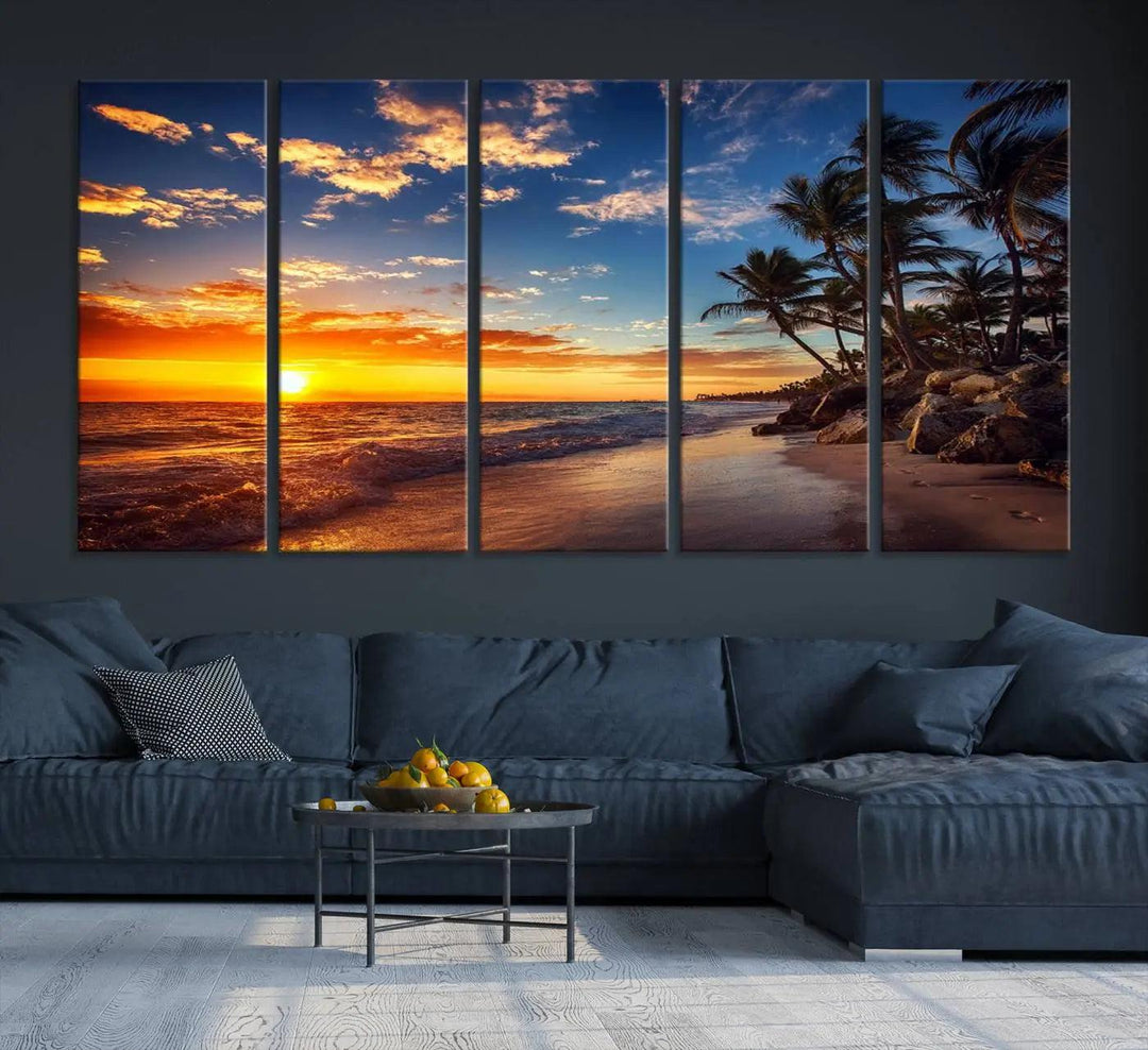 The Tropical Beach Sunset Canvas Art, featuring palm trees and ocean waves, brings an inviting atmosphere to coastal-themed homes.