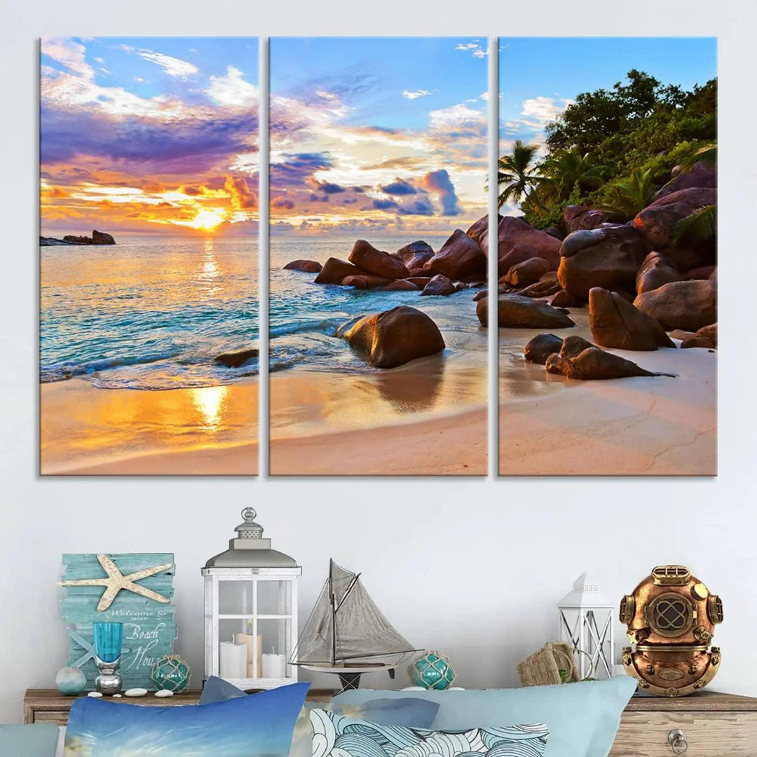 Tropical beach sunset canvas print featuring ocean waves and rocky shoreline. Coastal decor printed on giclee canvas with high-quality Canon print technology.