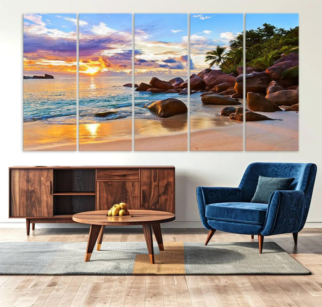 Tropical beach sunset canvas print featuring ocean waves and rocky shoreline. Coastal decor printed on giclee canvas with high-quality Canon print technology.