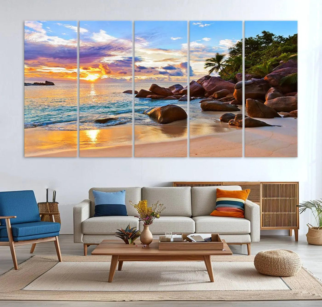 Tropical beach sunset canvas print featuring ocean waves and rocky shoreline. Coastal decor printed on giclee canvas with high-quality Canon print technology.