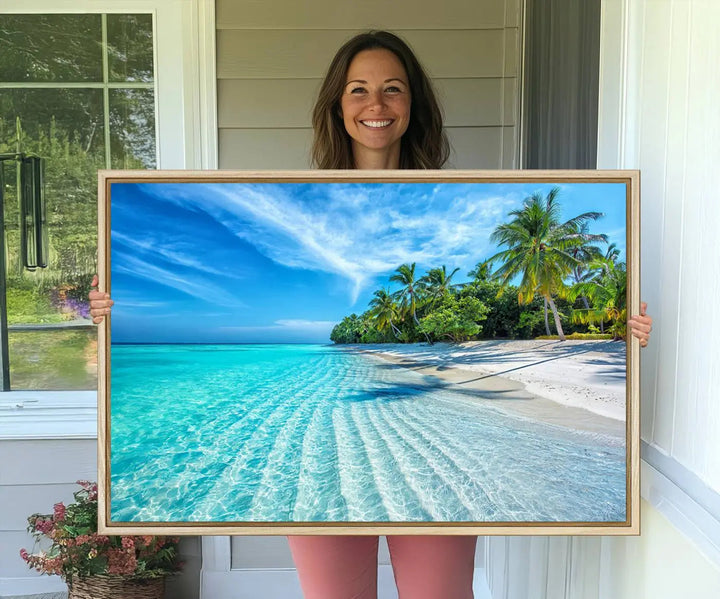 The Tropical Beach Wall Art Canvas Print showcases a serene ocean landscape with crystal clear turquoise water and palm trees, beautifully enhancing the coastal decor.