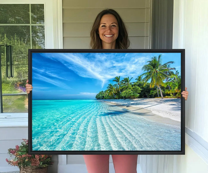 The Tropical Beach Wall Art Canvas Print showcases a serene ocean landscape with crystal clear turquoise water and palm trees, beautifully enhancing the coastal decor.