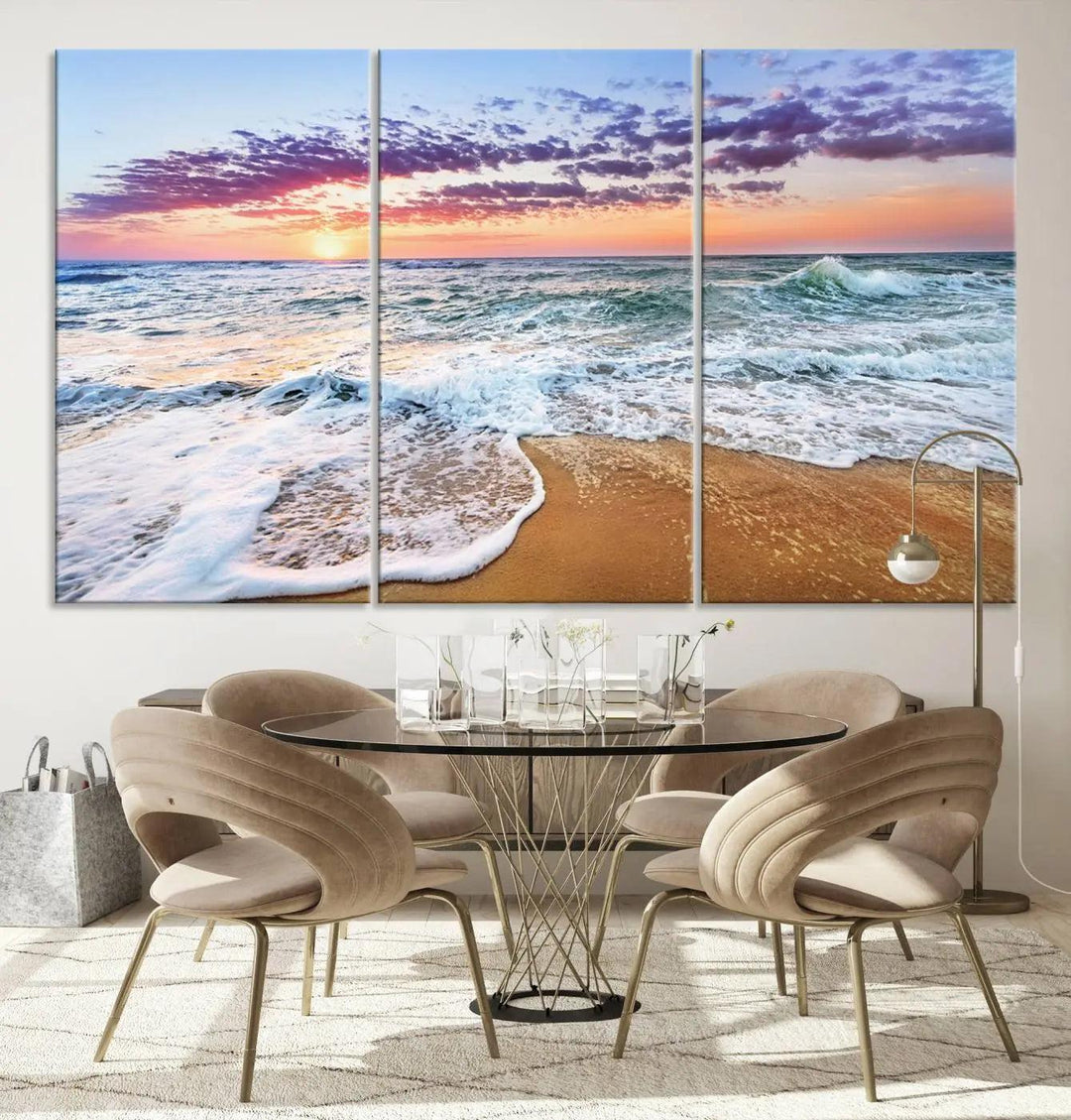 A triptych canvas wall art featuring the Tropical Beach Waves Art Print with a sunset ocean seascape adds striking beauty and perfectly complements the modern living room’s coastal decor.