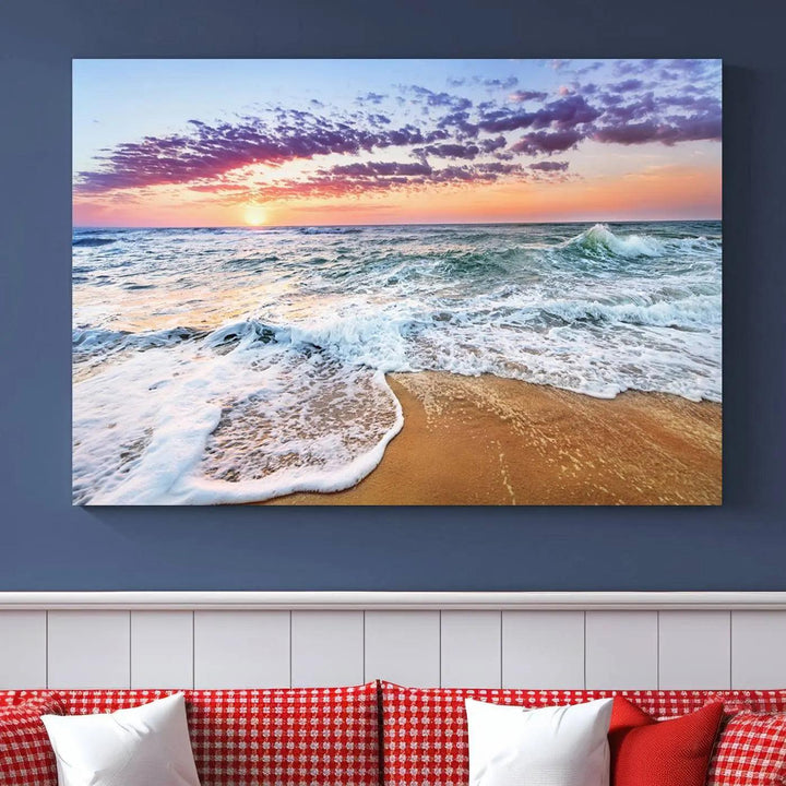 A triptych canvas wall art featuring the Tropical Beach Waves Art Print with a sunset ocean seascape adds striking beauty and perfectly complements the modern living room’s coastal decor.