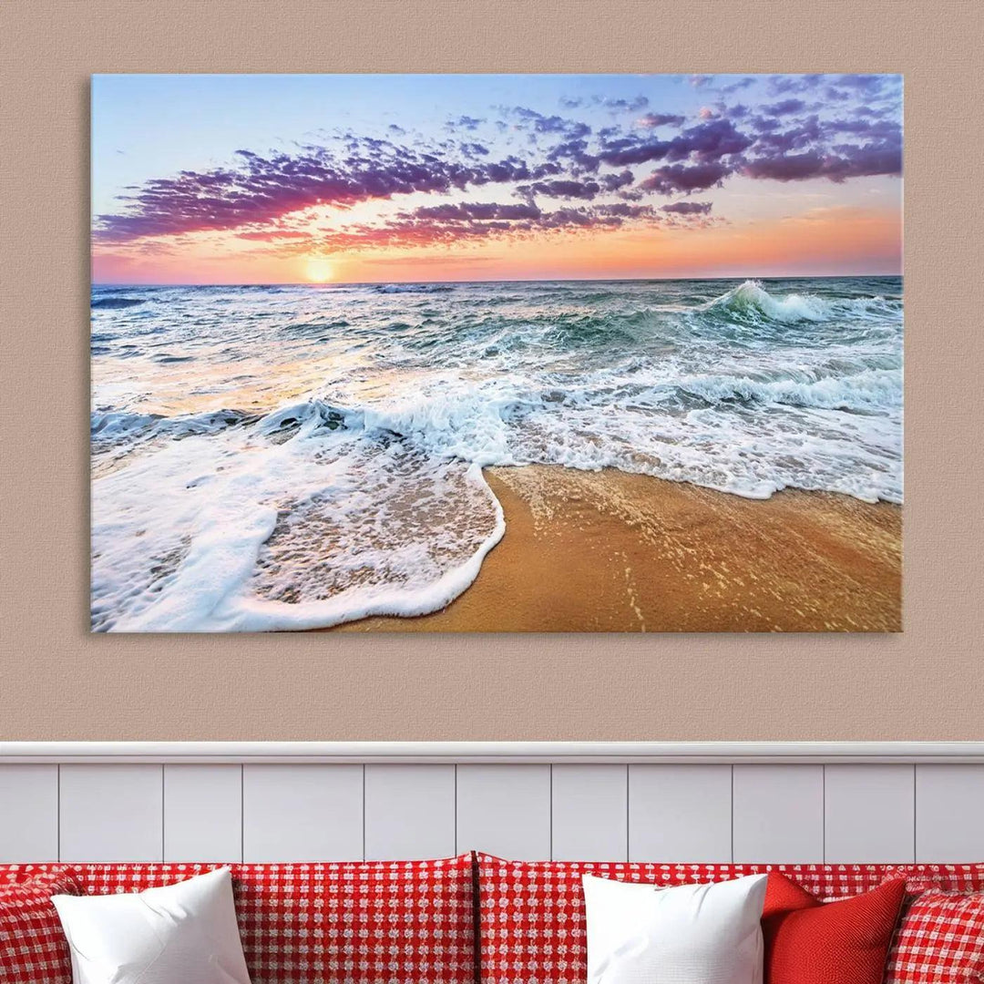 A triptych canvas wall art featuring the Tropical Beach Waves Art Print with a sunset ocean seascape adds striking beauty and perfectly complements the modern living room’s coastal decor.