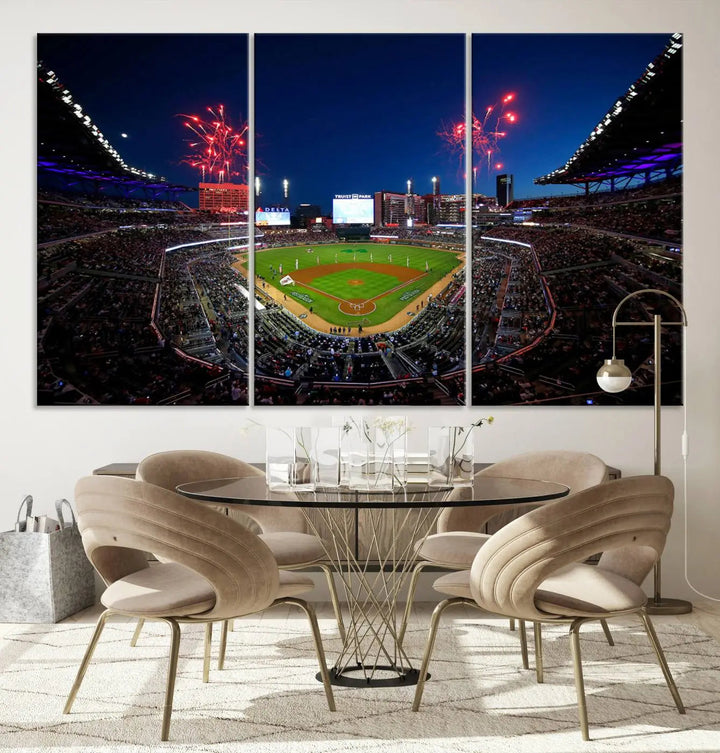 A nighttime scene of Truist Park with fireworks lighting up the sky comes to life in the Truist Park Atlanta Braves Baseball Stadium Wall Art Print, a large 3-panel canvas perfect for sports fans.