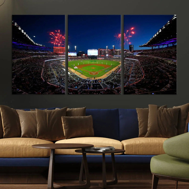 A nighttime scene of Truist Park with fireworks lighting up the sky comes to life in the Truist Park Atlanta Braves Baseball Stadium Wall Art Print, a large 3-panel canvas perfect for sports fans.