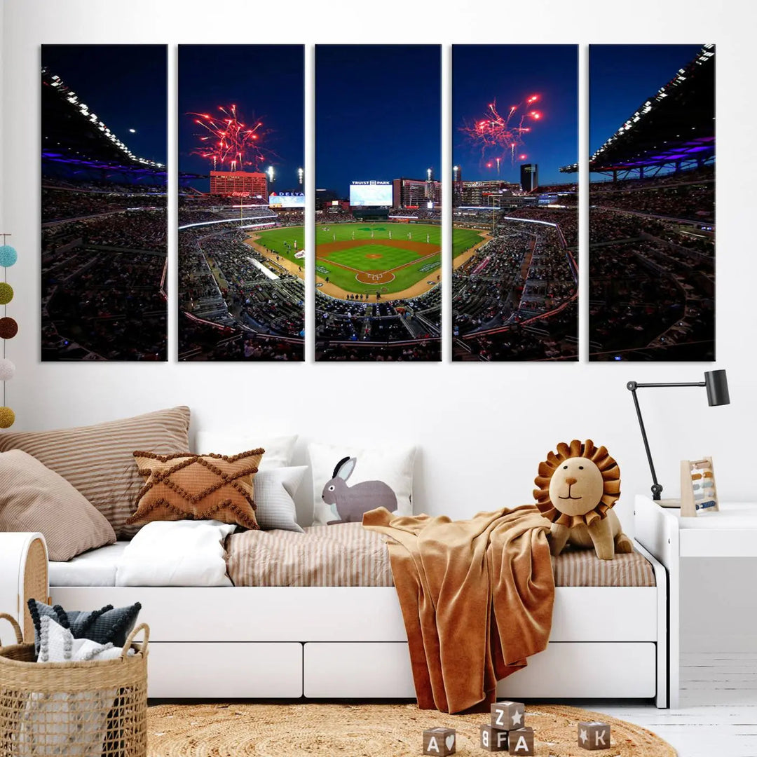 A nighttime scene of Truist Park with fireworks lighting up the sky comes to life in the Truist Park Atlanta Braves Baseball Stadium Wall Art Print, a large 3-panel canvas perfect for sports fans.