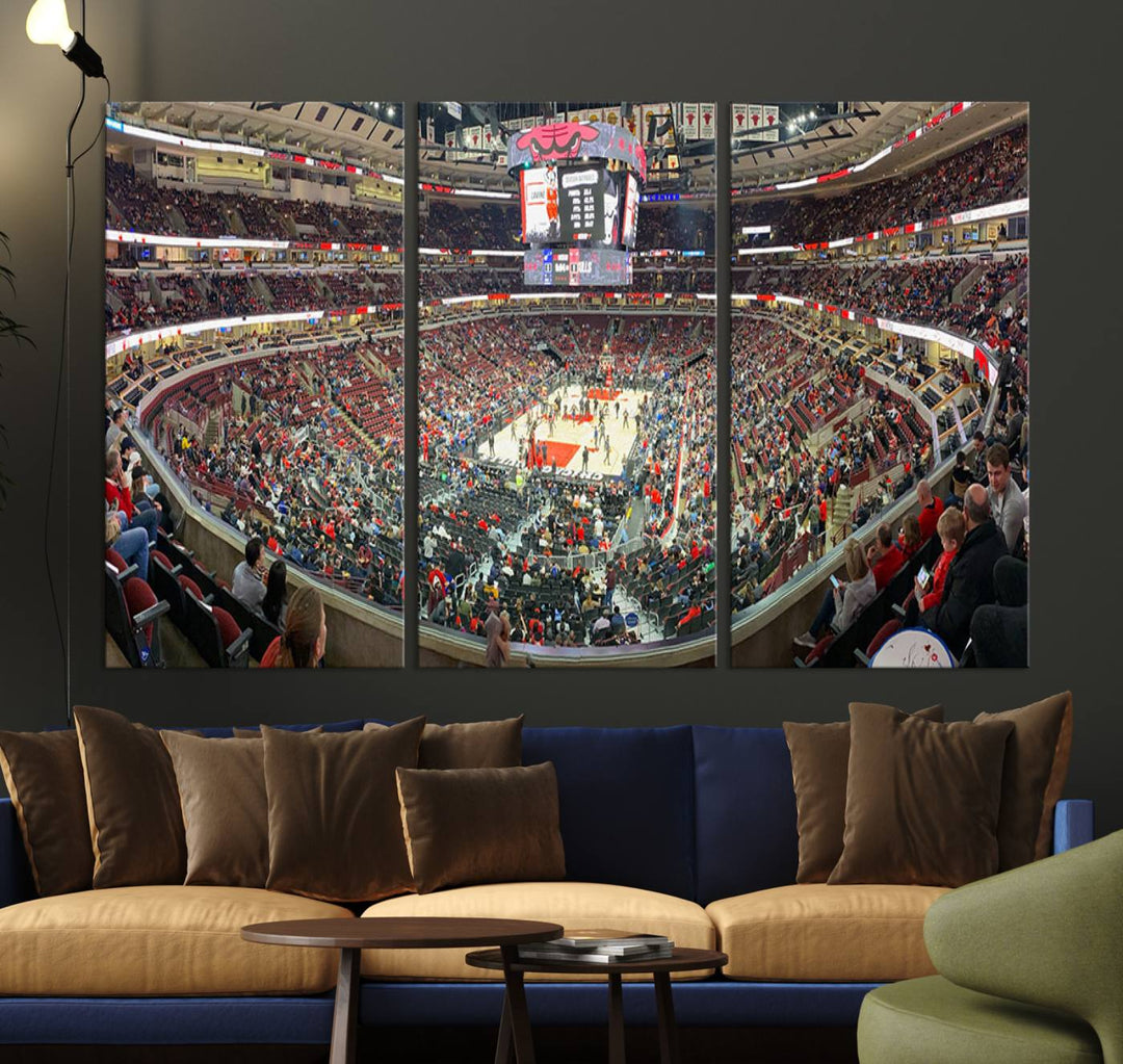 A panoramic view captures the bustling United Center during a Chicago Bulls game, showcasing the action on court and a prominent scoreboard overhead, ideal for immortalizing as a museum-quality canvas print.