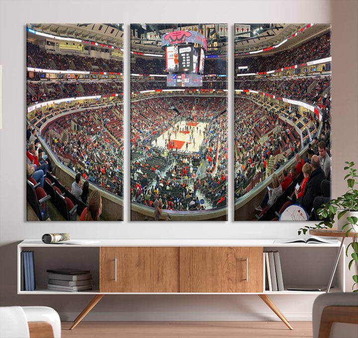 A panoramic view captures the bustling United Center during a Chicago Bulls game, showcasing the action on court and a prominent scoreboard overhead, ideal for immortalizing as a museum-quality canvas print.