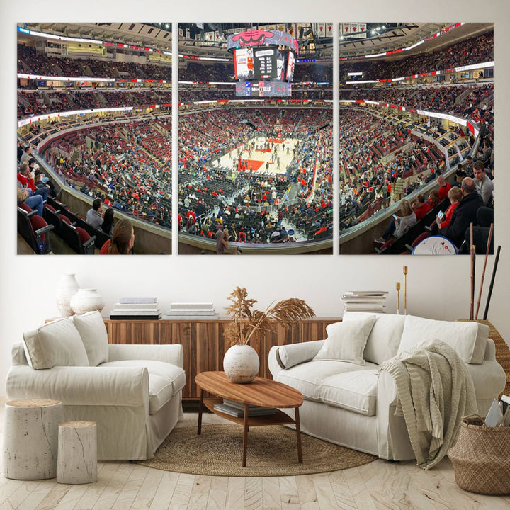 A panoramic view captures the bustling United Center during a Chicago Bulls game, showcasing the action on court and a prominent scoreboard overhead, ideal for immortalizing as a museum-quality canvas print.