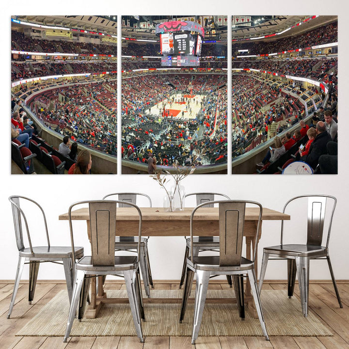 A panoramic view captures the bustling United Center during a Chicago Bulls game, showcasing the action on court and a prominent scoreboard overhead, ideal for immortalizing as a museum-quality canvas print.