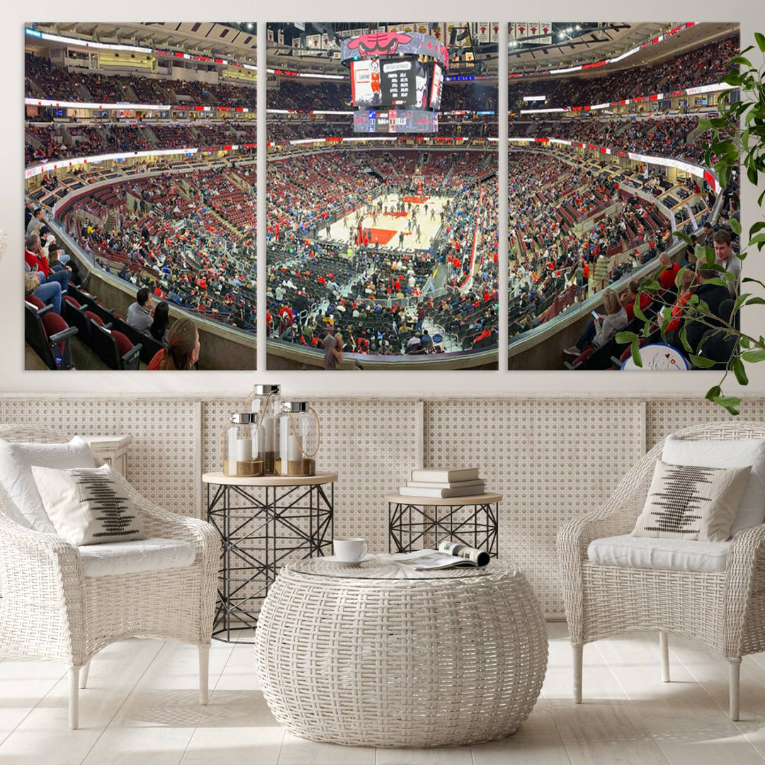 A panoramic view captures the bustling United Center during a Chicago Bulls game, showcasing the action on court and a prominent scoreboard overhead, ideal for immortalizing as a museum-quality canvas print.